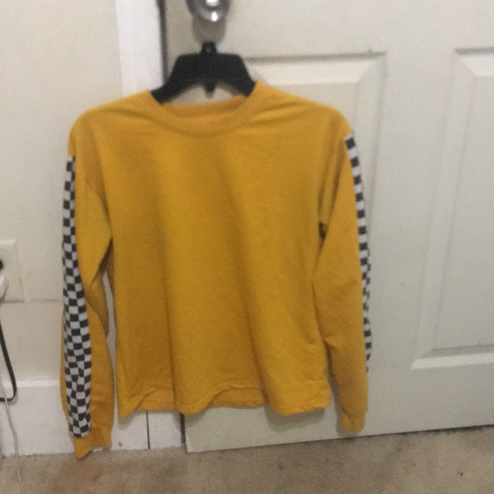 A yellow checkered sweatshirt without a hoodie